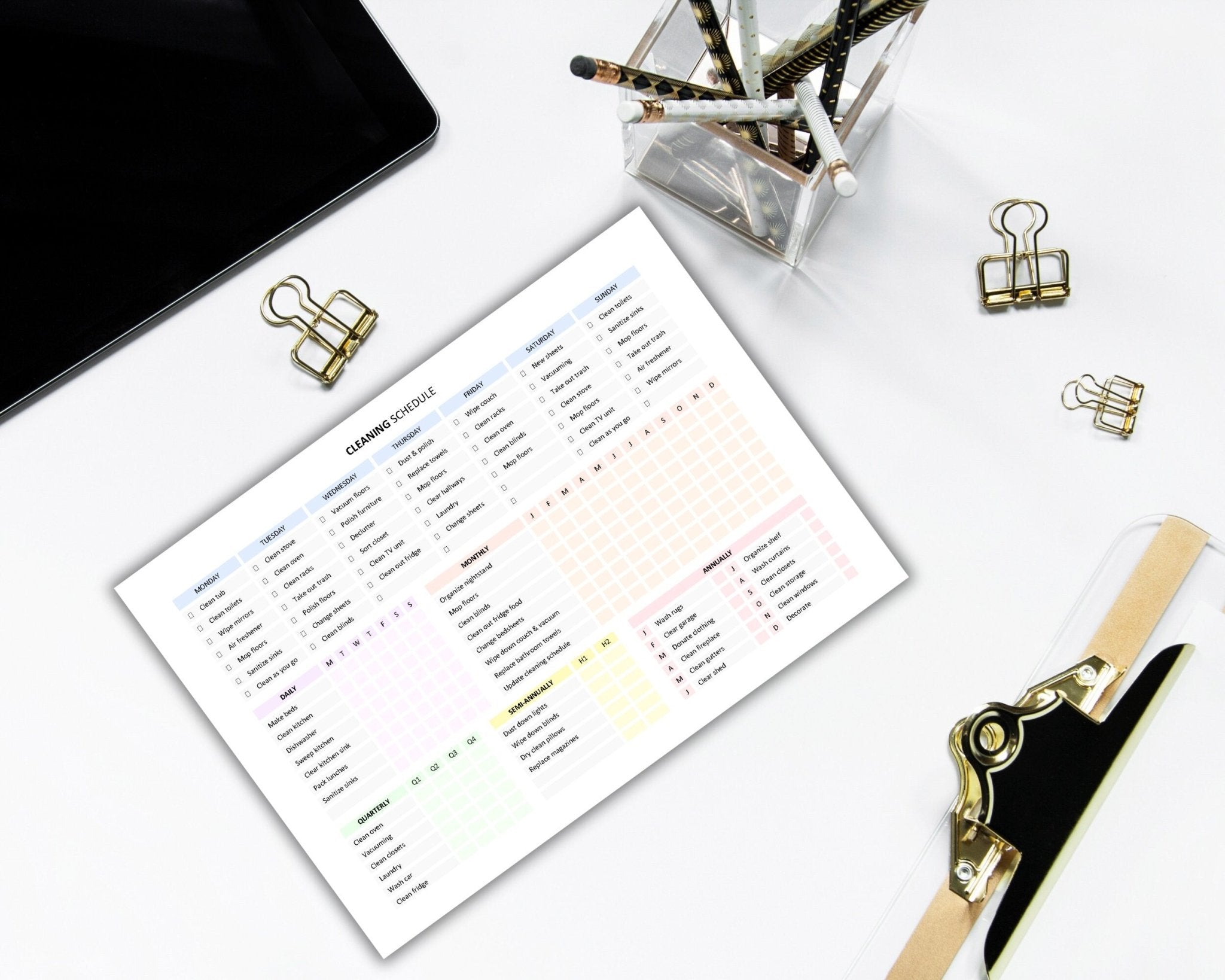 Cleaning routine planner printable on desk 