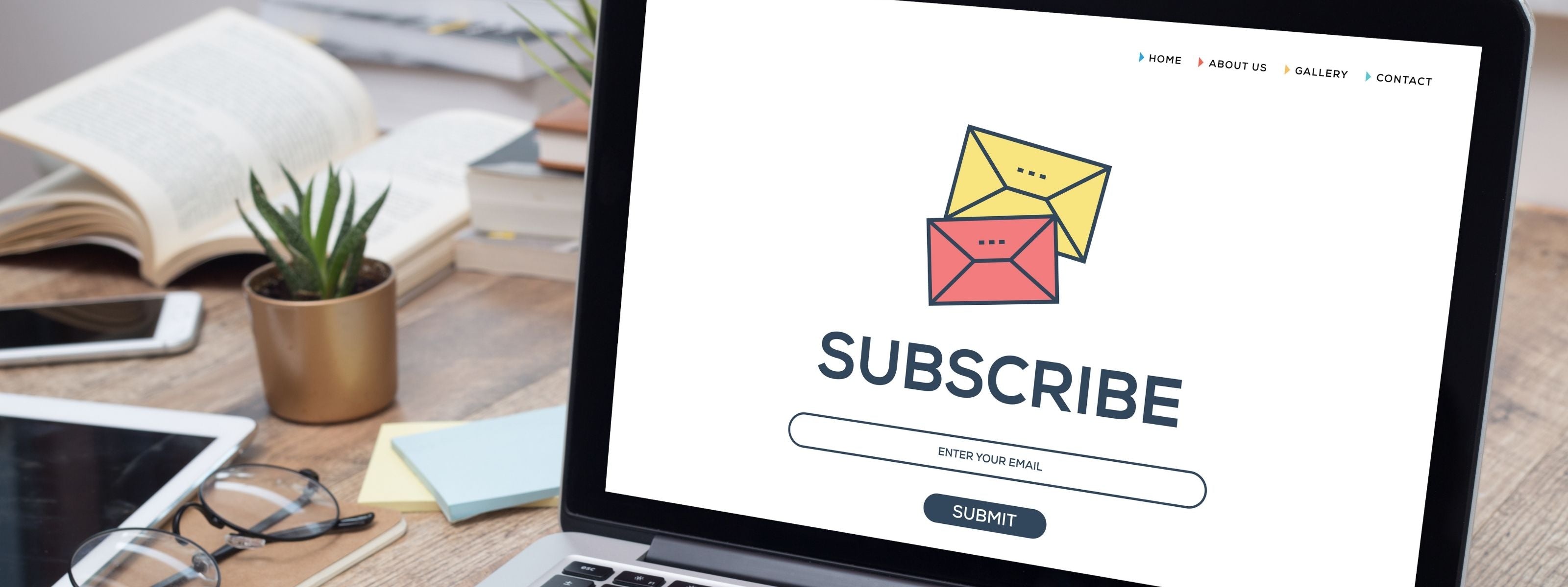 Subscribe for free digital templates – email marketing opt-in on workspace laptop at One Stop Centre