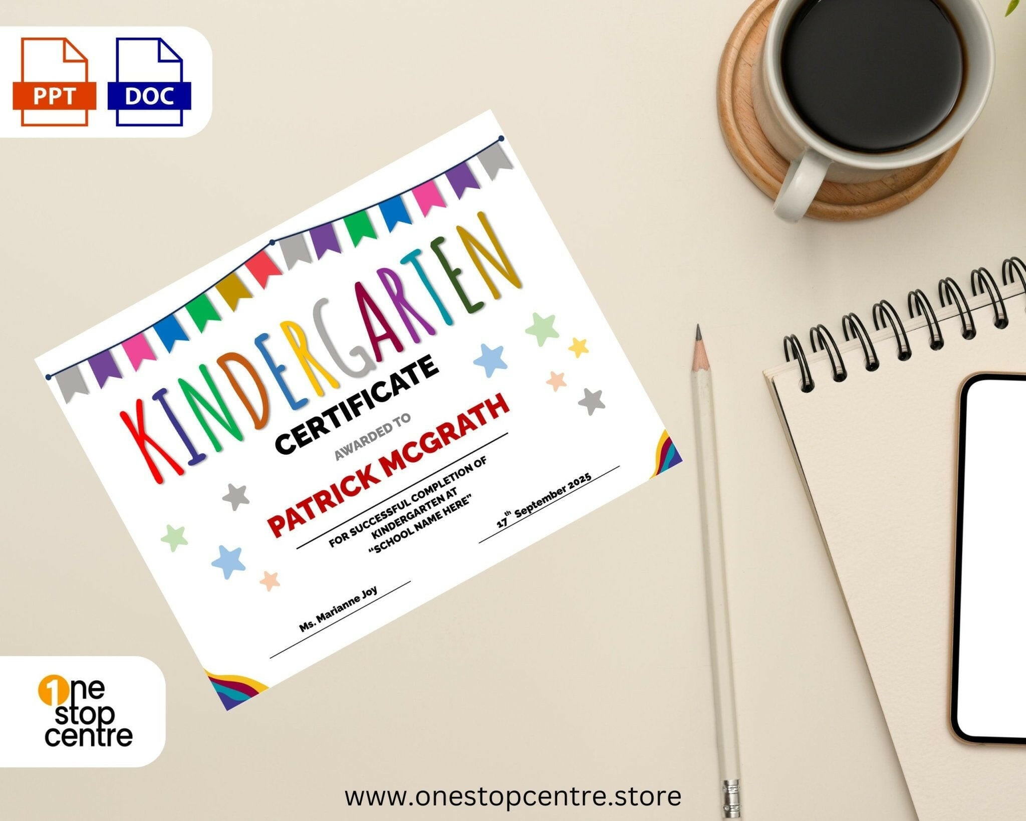 Kindergarten certificate on a desk with a cup of coffee and notebook